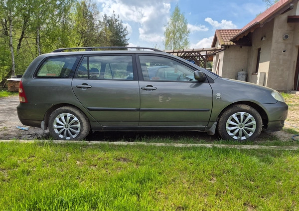 Toyota Corolla cena 7500 przebieg: 311000, rok produkcji 2003 z Strzelce Opolskie małe 121